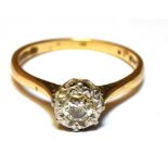 A DIAMOND SOLITAIRE ILLUSION SET 18CT YELLOW GOLD RING The small round brilliant cut diamond approx.