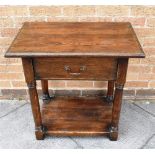 AN OAK SIDE TABLE the rectangular top with moulded edge, on ring turned supports united by
