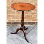 A MAHOGANY TRIPOD OCCASIONAL TABLE the circular pie-crust top 54cm diameter, 72cm high