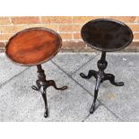 TWO MAHOGANY TRAY TOP WINE TABLES on tripod supports, 25cm and 28cm diameter, each 50cm high