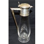 A VICTORIAN SILVER TOPPED GLASS CLARET JUG The plain silver top with angular handle hallmarks for