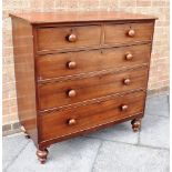 A VICTORIAN MAHOGANY CHEST OF TWO SHORT AND THREE LONG DRAWERS on turned supports, 107cm wide 50cm