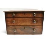 A SMALL MAHOGANY CHEST OF THREE GRADUATED DRAWERS 43cm wide 35cm deep 27cm high