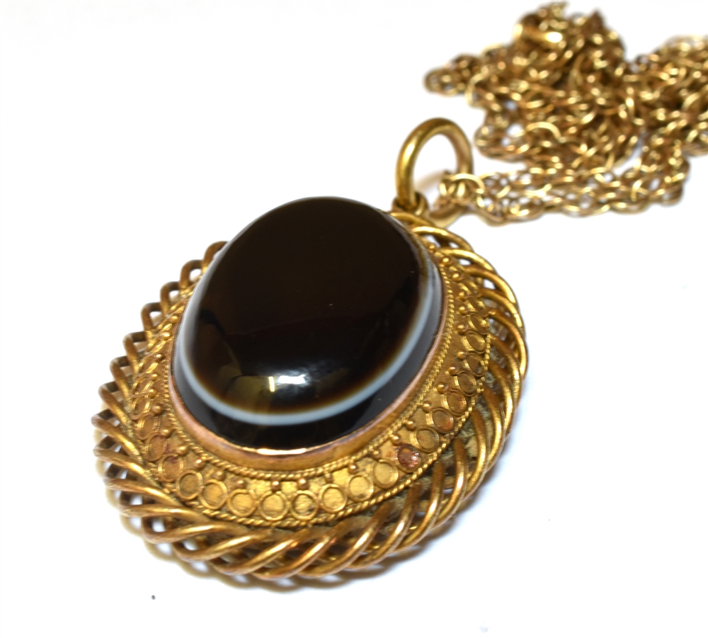 A VICTORIAN BANDED BLACK AGATE OVAL PENDANT And later 9ct gold chain, the Etruscan style oval - Image 2 of 3