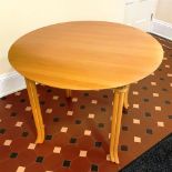 A CONTEMPORARY LLOYD LOOM TABLE the circular top 100cm diameter, labelled to frame