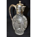 A JAMES DIXON & SONS SILVER TOPPED GLASS CLARET JUG The plain silver top and handle with domed