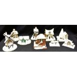 A GROUP OF NINE COALPORT MODEL COTTAGES AND BUILDINGS