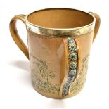 HANNAH BARLOW FOR DOULTON LAMBETH: a large silver-mounted three-handled tyg, hallmarked London 1878,