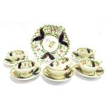 A SET OF SIX VICTORIAN LUSTRE CUPS AND SAUCERS and matching dish, 23cm diameter