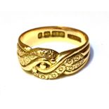 A VICTORIAN 18CT YELLOW GOLD PATTERNED BAND RING The twist design front decorated with small
