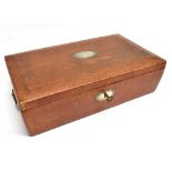 A REGENCY LEATHER COVERED BOX with velvet lined interior, white metal cartouche and escutcheon, 31cm