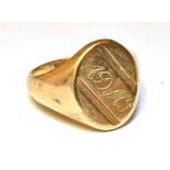 A GENT'S 9CT GOLD PLAIN SIGNET RING The oval head initialled, weighing approx. 10.7g