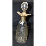 A SILVER TOPPED DECANTER By Walker and Hall, the petal form plain silver top with glass stopper,