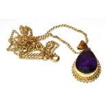 A 9CT GOLD AMETHYST SINGLE STONE PENDANT AND CHAIN The pear cut amethyst 16mm x 10mm, gross