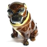 A 19TH CENTURY CONTINENTAL MAJOLICA TOBACCO JAR modelled as a seated pug dog wearing ribboned