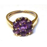 AN AMETHYST CLUSTER 9CT YELLOW GOLD DRESS RING Ring size J ½, gross weight approx. 2.3g