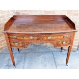 AN EDWARDIAN MAHOGANY BOW FRONT WASHSTAND with foliate marquetry inlaid decoration, fitted with four