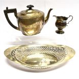 THREE ITEMS OF SILVER Comprising an oval centre dish with pierced diamond design; a teapot of