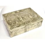 A BERTHOLD MULLER SILVER BOX with gilt interior, embossed decoration of a country tavern scene on