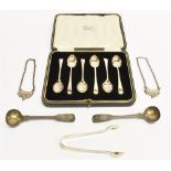 A BOXED SET OF SILVER TEASPOONS Together with a pair of Victorian silver preserve spoons; sugar