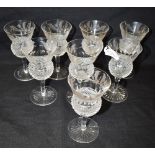 A SET OF EIGHT EDINBURGH CRYSTAL 'THISTLE' GLASSES with facet cut sides and stem, and engraved