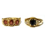 TWO 9CT GOLD STONE SET DRESS RINGS One set with three garnets, the other set with a single blue