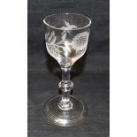 AN 18TH CENTURY WINE GLASS the bell shaped bowl engraved with a bird and foliage, on plain knopped