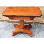 A VICTORIAN MAHOGANY CARD TABLE the top with beaded edge, on tapering octagonal pillar, 92cm wide