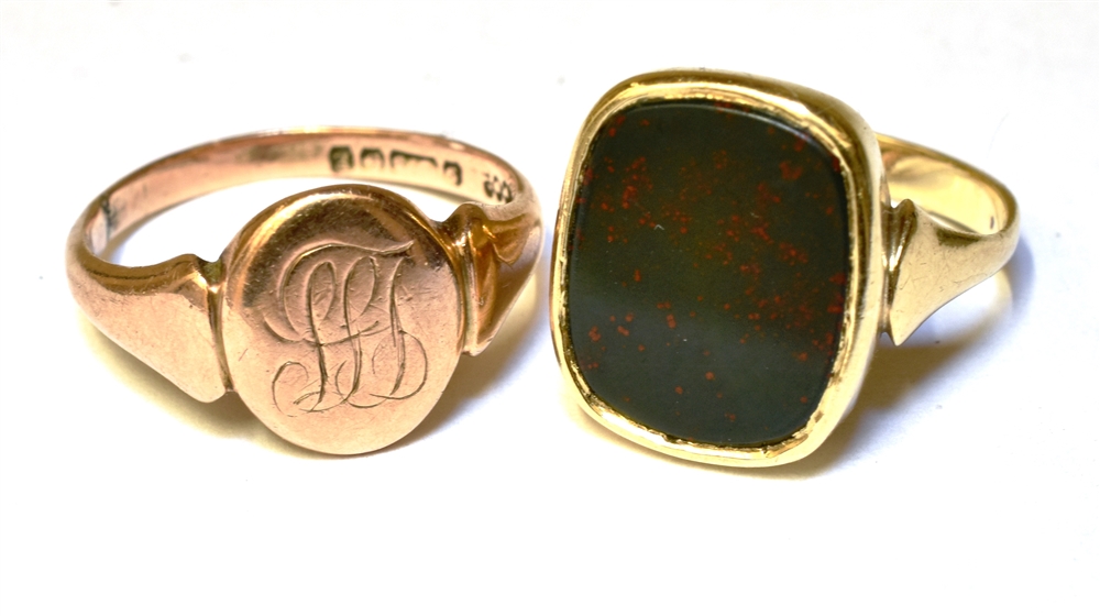 TWO 9CT YELLOW GOLD SIGNET RINGS Comprising a black Onyx set, size I, unmarked, assessed as 9ct