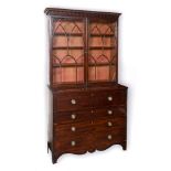 A WILLIAM IV MAHOGANY SECRETAIRE BOOKCASE with moulded frieze above astragal glazed doors opening to