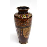 A BALUSTER SHAPED CLOISONNE VASE decorated with dragons and birds on a burgundy ground, 18.5cm high