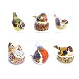 A GROUP OF SIX ROYAL CROWN DERBY PAPERWEIGHTS all modelled as birds, comprising 'Goldfinch