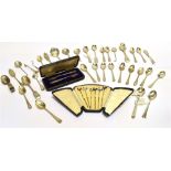 A QUANTITY OF THIRTY-TWO ASSORTED AND PART SETS OF SILVER TEASPOONS Together with a boxed set of six