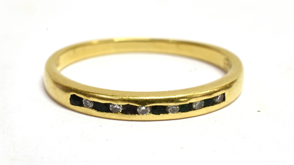 AN 18CT YELLOW GOLD BAND RING Channel set to front with six small diamonds alternating with small - Image 3 of 3