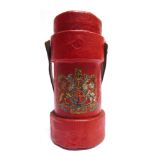 MILITARIA - A CORK, CANVAS AND LEATHER CORDITE CARRIER painted red with a transfer-printed Royal
