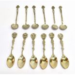 TWO SETS OF SIX SILVER COFFEE SPOONS comprising a set of six with a figure holding a crowned