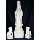 A LARGE CHINESE BLANC DE CHINE FIGURE OF GUANYIN 48cm high, and pair of dogs of Fo