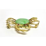 A JADEITE SINGLE STONE SET CRAB BROOCH the central oval cabochon cut jadeite 18mm x 12mm, small