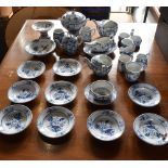 A GROUP OF CONTINENTAL PORCELAIN with underglaze blue floral decoration, including feeding cups, pap