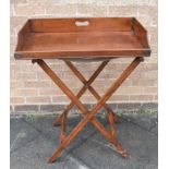 A 19TH CENTURY BRASS MOUNTED BUTLERS TRAY ON STAND the tray 72cm wide 46cm deep