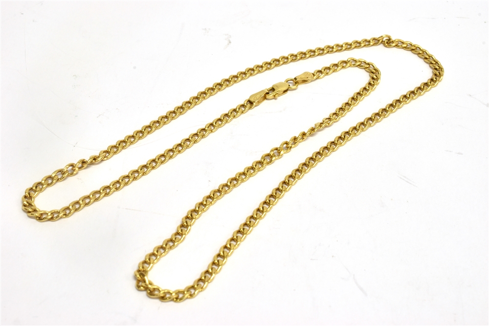 A HALLMARKED MODERN 9CT YELLOW GOLD CHAIN Hollow twisted curb links to trigger claw fastener 18