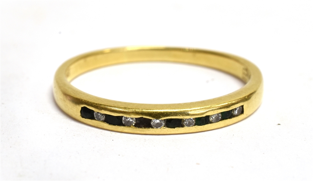 AN 18CT YELLOW GOLD BAND RING Channel set to front with six small diamonds alternating with small - Image 2 of 3