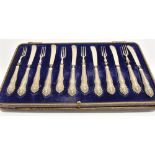 A CASED SET OF TWELVE PICKLE KNIVES AND FORKS with silver handles, hallmarks for Sheffield 1900,