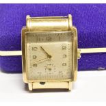 A GENTS 1950's VINTAGE 9CT GOLD PRESENTATION WATCH Square white dial, subsidiary seconds dial,