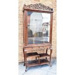 A CHINESE HARDWOOD DISPLAY STAND the cornice with pierced decoration, glaze door opening to an