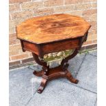 A VICTORIAN ROSEWOOD TRUMPET SHAPED WORK TABLE the octagonal top opening to fitted interior and work