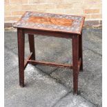 A CARVED MAHOGANY STOOL the moulded supports united by H-shaped stretcher