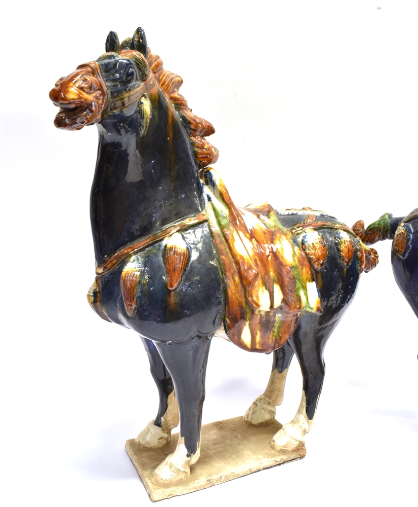A LARGE PAIR OF CHINESE TANG STYLE FIGURES OF HORSES decorated in sancai glaze, 48cm high - Image 2 of 3
