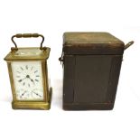 A FRENCH BRASS CARRIAGE CLOCK WITH CALENDAR MOVEMENT the enamel dial with Roman numerals and
