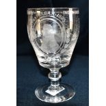 A 19TH CENTURY GLASS RUMMER engraved with a portrait of Nelson and a Trafalgar scene, 16cm high